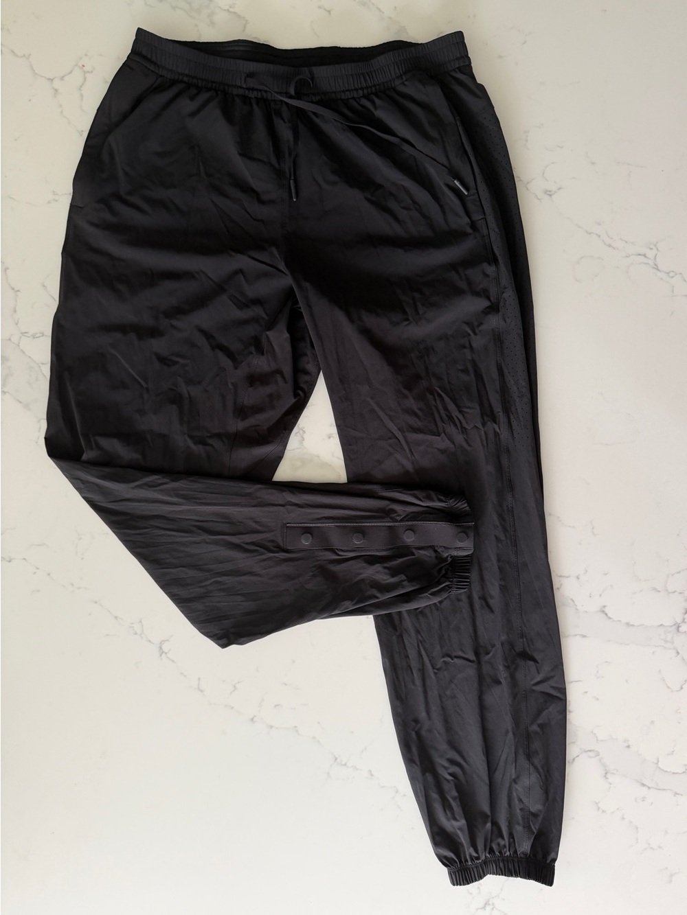 Lululemon Men's Black Jogger Pants with magnetic Button Cuff